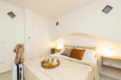 Letto o letti in una camera di Villa Sole