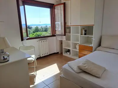Letto o letti in una camera di Nice Apartment in Margine Rosso