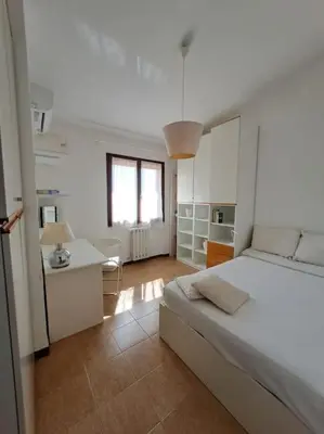 Letto o letti in una camera di Nice Apartment in Margine Rosso