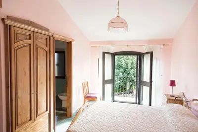Letto o letti in una camera di Bari Sardo Suite Padronale