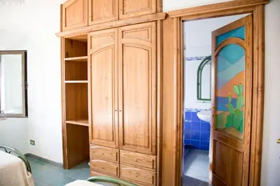 Letto o letti in una camera di Bari Sardo Suite Padronale