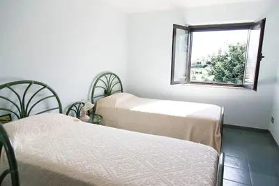 Letto o letti in una camera di Bari Sardo Suite Padronale
