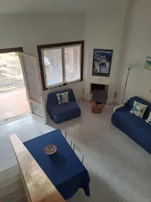 Letto o letti in una camera di Sardegna Calaverde Villetta