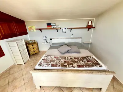 Letto o letti in una camera di Eri & Ely's House By La Via Del Mare Viaggi e Vacanze