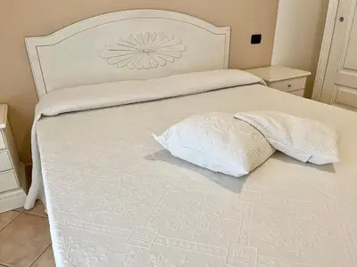 Letto o letti in una camera di Eri & Ely's House By La Via Del Mare Viaggi e Vacanze