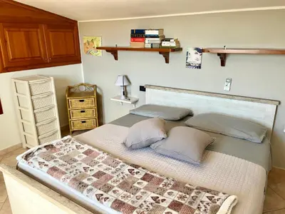 Letto o letti in una camera di Eri & Ely's House By La Via Del Mare Viaggi e Vacanze
