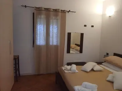 Letto o letti in una camera di Casa Murru