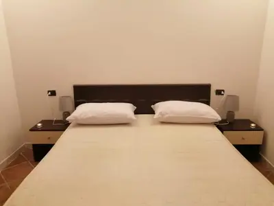 Letto o letti in una camera di Casa Murru
