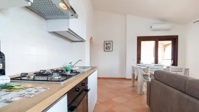 Cucina o angolo cottura di Zenzerino Apartment-Cabras