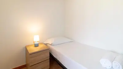 Letto o letti in una camera di Zenzerino Apartment-Cabras
