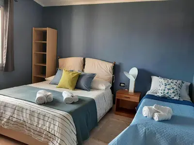 Letto o letti in una camera di Sa Mendula