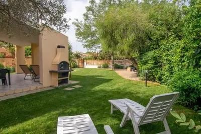 Giardino di Casa Kody a 500 mt dalla spiaggia di Geremeas