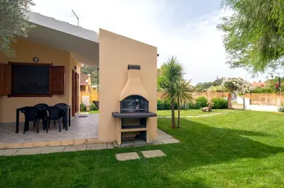 Giardino di Casa Kody a 500 mt dalla spiaggia di Geremeas