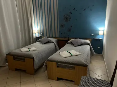 Letto o letti in una camera di La Fede Sarda