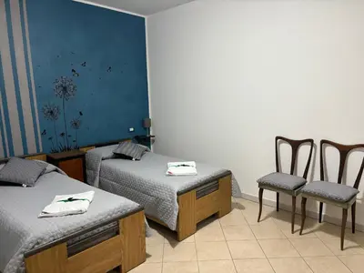 Letto o letti in una camera di La Fede Sarda