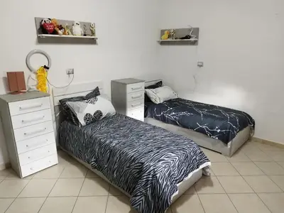 Letto o letti in una camera di Casa BACU ABIS