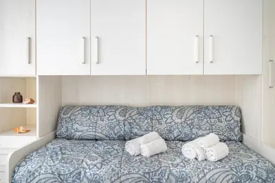Letto o letti in una camera di CasaPoetto