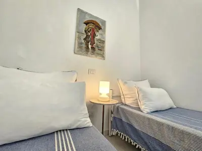 Letto o letti in una camera di Villa Azzurra vista mozzafiato