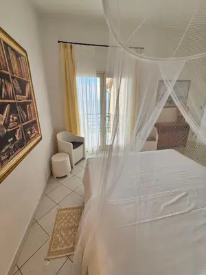 Letto o letti in una camera di Villa Azzurra vista mozzafiato