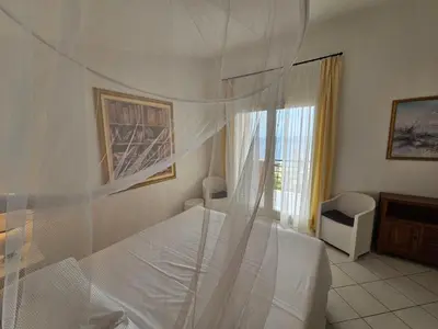 Letto o letti in una camera di Villa Azzurra vista mozzafiato