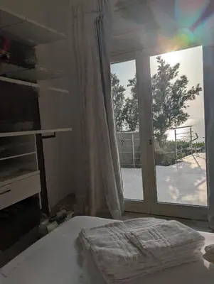 Letto o letti in una camera di Villa Azzurra splendor