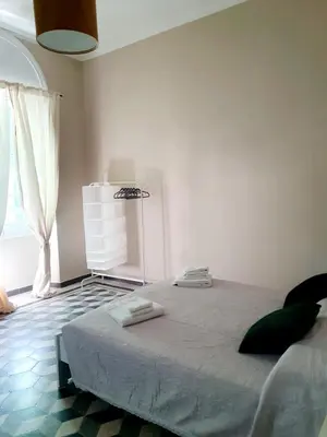 Letto o letti in una camera di Mariolina's Suites