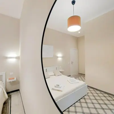 Letto o letti in una camera di Mariolina's Suites