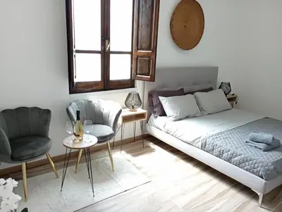 Letto o letti in una camera di NIU Rooms