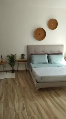 Letto o letti in una camera di NIU Rooms