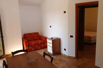 Area soggiorno di Bari Sardo Le More Suite 4