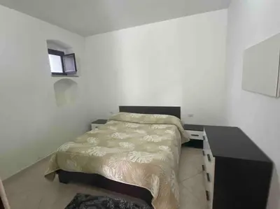 Letto o letti in una camera di La casetta