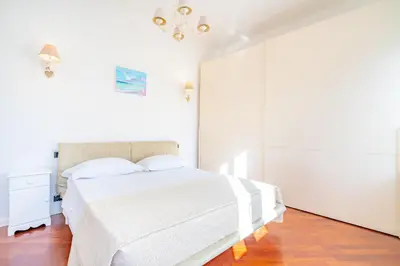 Letto o letti in una camera di Perle Gemelle in Marina