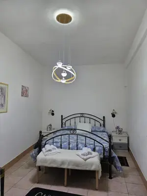 Letto o letti in una camera di Casa Grilla