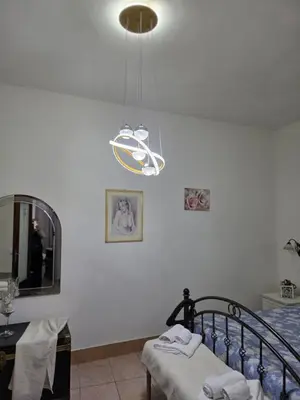 Letto o letti in una camera di Casa Grilla
