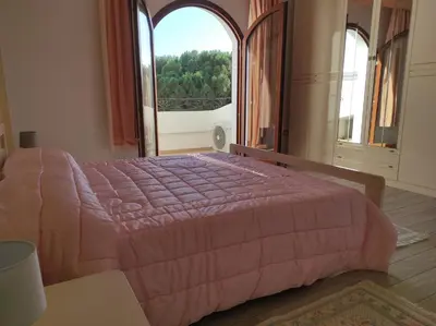 Letto o letti in una camera di Villa Fraisca