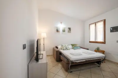 Letto o letti in una camera di Edo Apartment Muravera