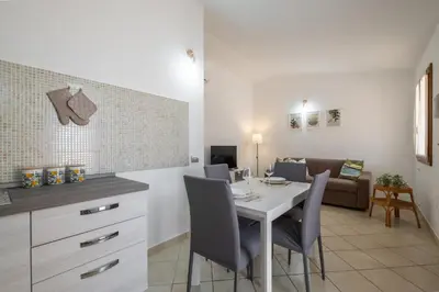 Area soggiorno di Edo Apartment Muravera