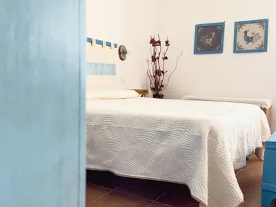 Letto o letti in una camera di Da Nonno Francesco