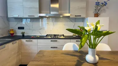 Cucina o angolo cottura di Domo Mea Apartment