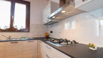 Cucina o angolo cottura di Domo Mea Apartment