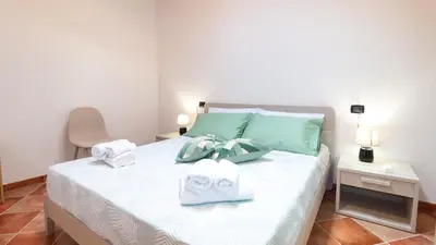 Letto o letti in una camera di Domo Mea Apartment