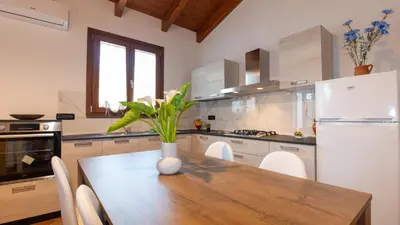 Cucina o angolo cottura di Domo Mea Apartment
