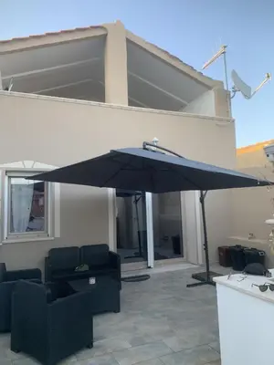 Balcone o terrazza di WellHouse Sant'Antioco - Relax e comfort a pochi minuti dalle spiagge