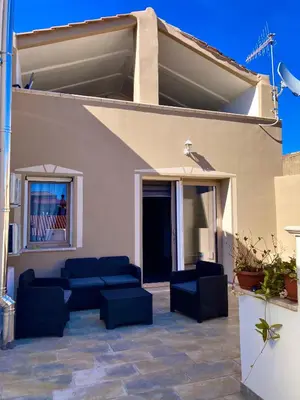 Area soggiorno di WellHouse Sant'Antioco - Relax e comfort a pochi minuti dalle spiagge