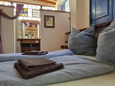 Letto o letti in una camera di Casa Olive