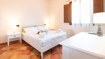 Letto o letti in una camera di Domo Mea Rooms