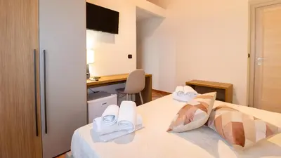 Letto o letti in una camera di Domo Mea Rooms