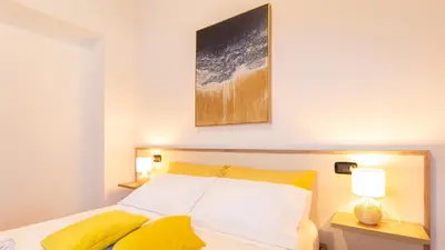Letto o letti in una camera di Domo Mea Rooms