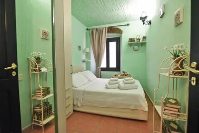 Letto o letti in una camera di Il Portoncino casa vacanze