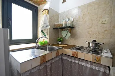 Cucina o angolo cottura di Il Portoncino casa vacanze